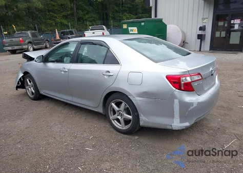 2014 Toyota Camry Le z USA, uszkodzony, nr VIN 4T4BF1FK3ER383164